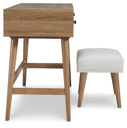 Thadamere Vanity/UPH Stool (2/CN) Furniture Mart -  online today or in-store at our location in Duluth, Ga. Furniture Mart Georgia. View our lowest price today. Shop Now. 