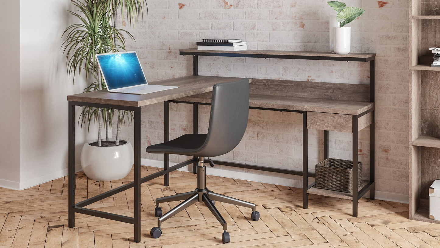 Arlenbry L-Desk with Storage Furniture Mart -  online today or in-store at our location in Duluth, Ga. Furniture Mart Georgia. View our lowest price today. Shop Now. 