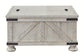 Carynhurst Cocktail Table with Storage Furniture Mart -  online today or in-store at our location in Duluth, Ga. Furniture Mart Georgia. View our lowest price today. Shop Now. 