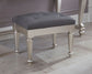 Coralayne Upholstered Stool (1/CN) Furniture Mart -  online today or in-store at our location in Duluth, Ga. Furniture Mart Georgia. View our lowest price today. Shop Now. 
