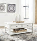 Kanwyn Rectangular Cocktail Table Furniture Mart -  online today or in-store at our location in Duluth, Ga. Furniture Mart Georgia. View our lowest price today. Shop Now. 