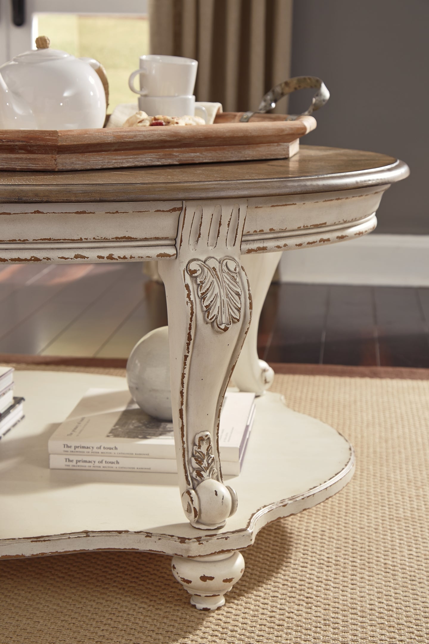 Realyn Oval Cocktail Table Furniture Mart -  online today or in-store at our location in Duluth, Ga. Furniture Mart Georgia. View our lowest price today. Shop Now. 