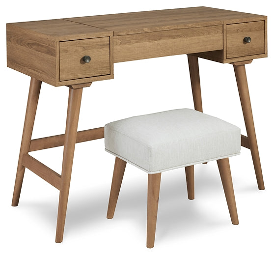 Thadamere Vanity/UPH Stool (2/CN) Furniture Mart -  online today or in-store at our location in Duluth, Ga. Furniture Mart Georgia. View our lowest price today. Shop Now. 